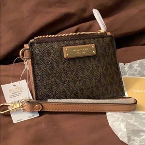 Micheal Kors clutch/wristlet purse. BrandNWT.